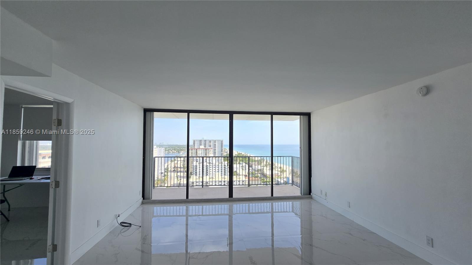 2101 South Ocean Drive, Unit 2004 Hollywood, FL 33019 - Photo 1 of 15 a view of an empty room with a window