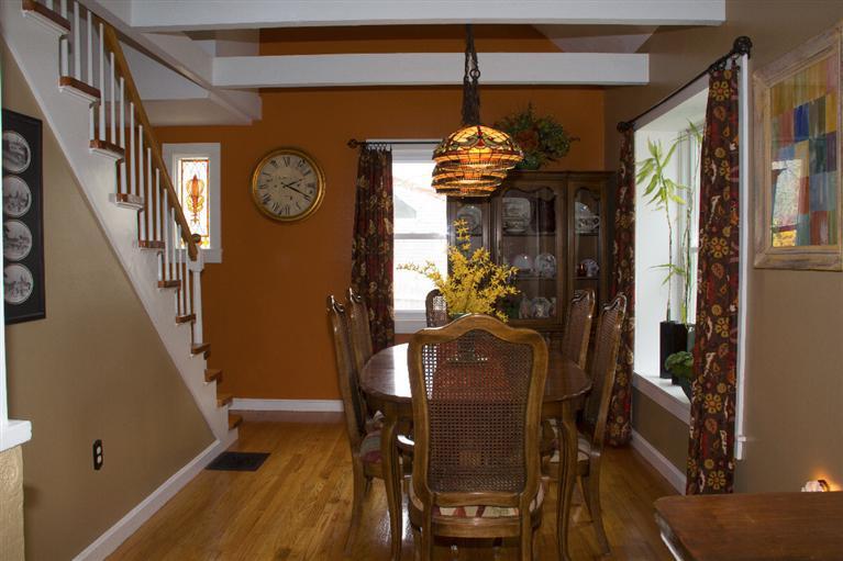808 Old Stage Road Centerville, MA 02632 - Photo 15 of 35 a view of a dining room with furniture wooden floor and chandelier