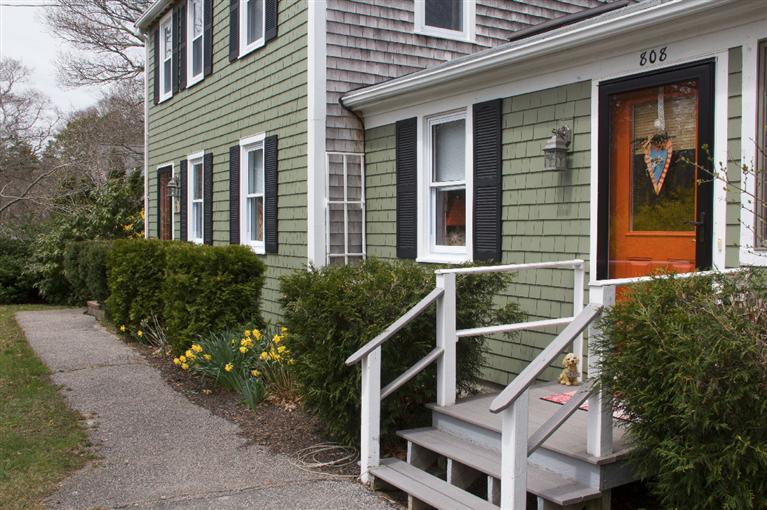 808 Old Stage Road Centerville, MA 02632 - Photo 2 of 35 front view of a house with a street