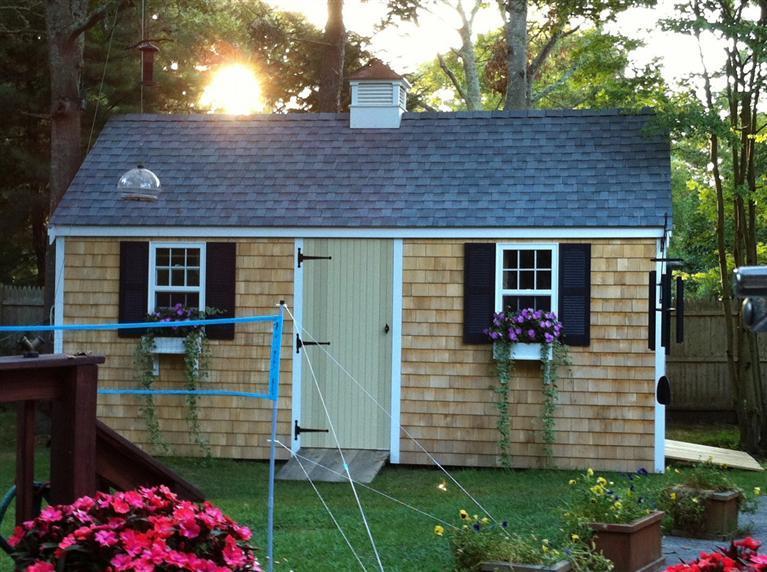 808 Old Stage Road Centerville, MA 02632 - Photo 33 of 35 a front view of a house with garden