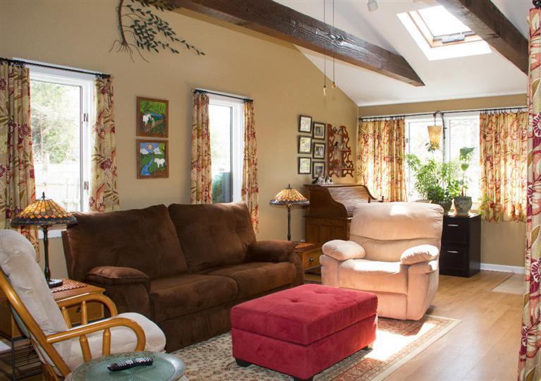 808 Old Stage Road Centerville, MA 02632 - Photo 5 of 35 a living room with furniture and a large window