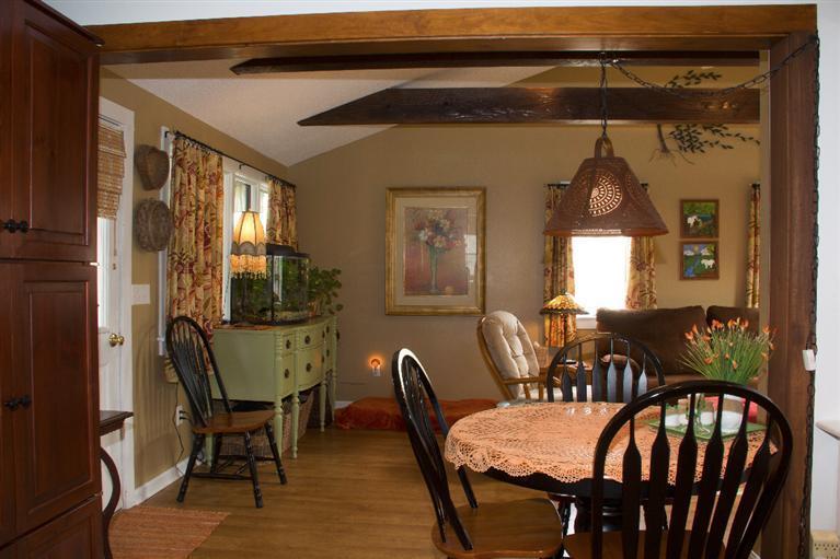 808 Old Stage Road Centerville, MA 02632 - Photo 8 of 35 a view of a dining room with furniture and window