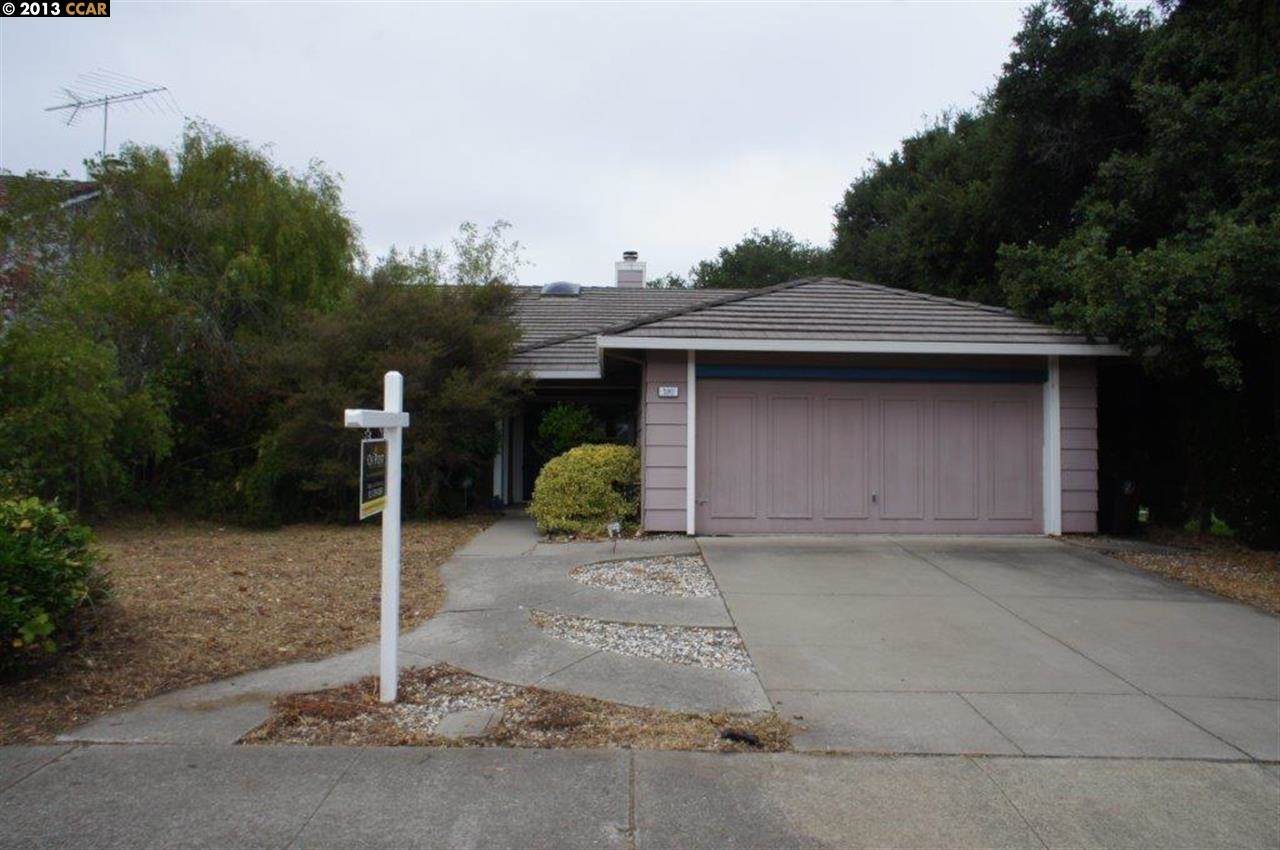 590 Marlesta Road Pinole, CA 94564 - Photo 1 of 1 a front view of a house with a yard