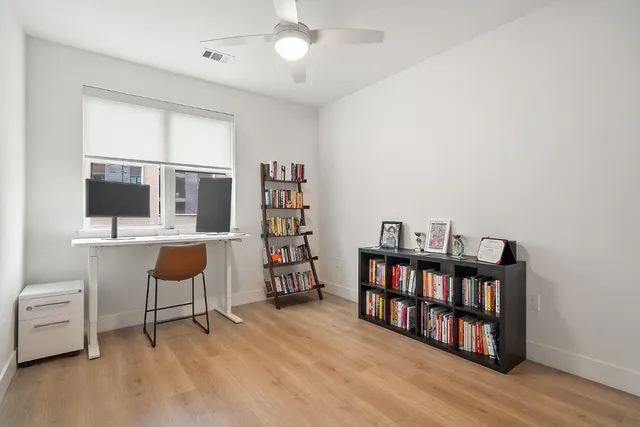 a workspace with a bookshelf