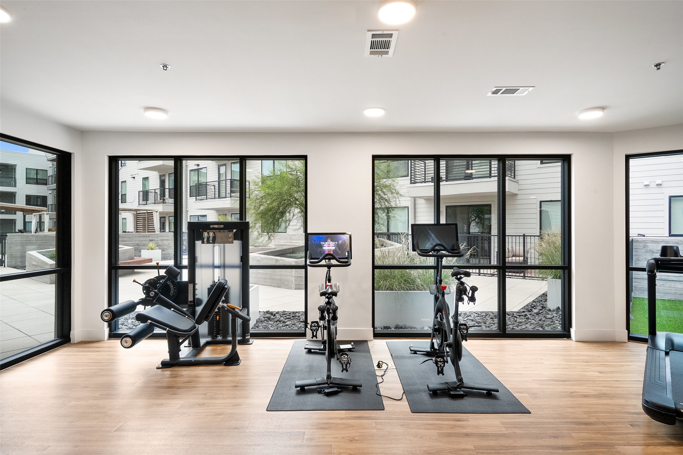 1701 Simond Avenue, Unit 305 Austin, TX 78723 - Photo 22 of 31 a view of a room with gym equipment