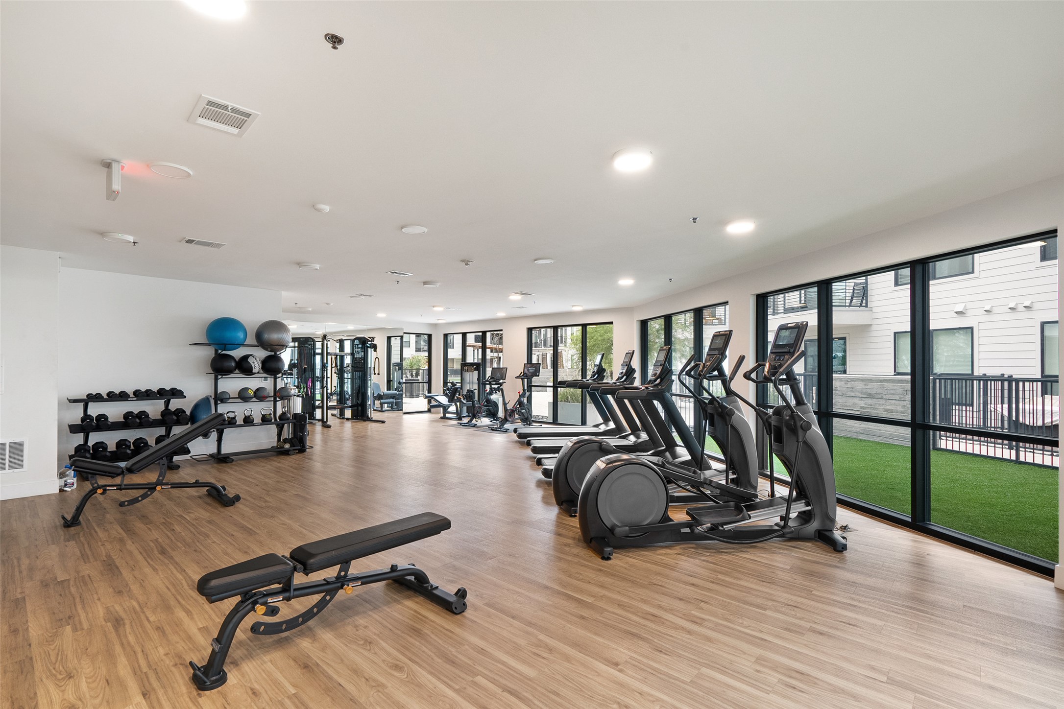 1701 Simond Avenue, Unit 305 Austin, TX 78723 - Photo 24 of 31 a view of a room with gym equipment