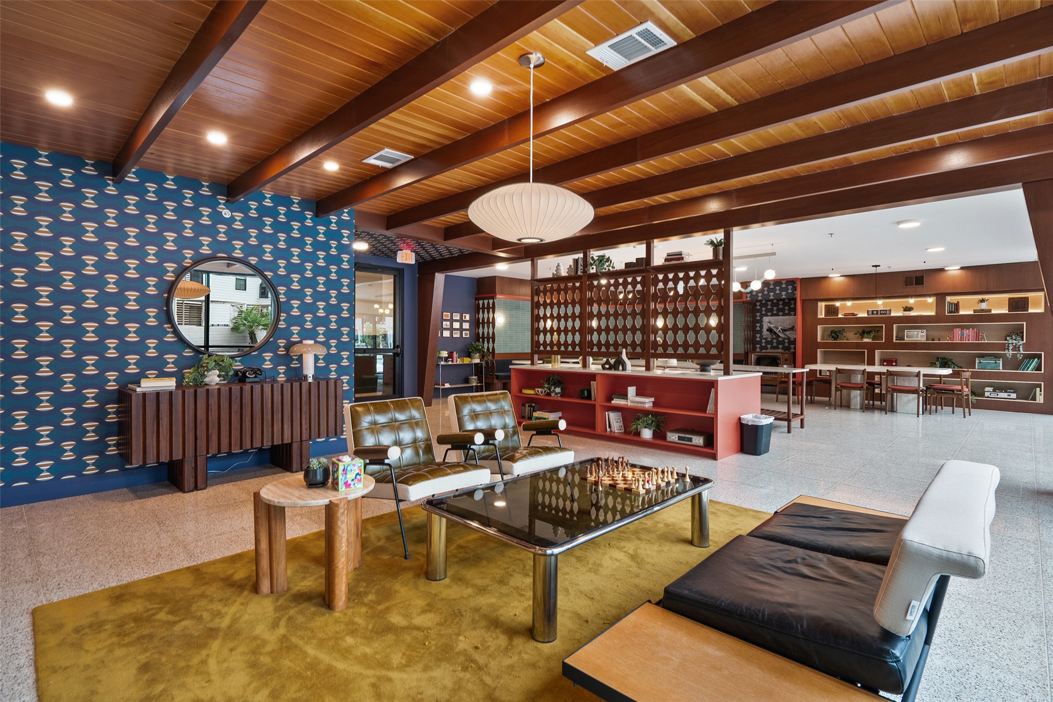 1701 Simond Avenue, Unit 305 Austin, TX 78723 - Photo 25 of 31 a living room with patio furniture and a wooden floor