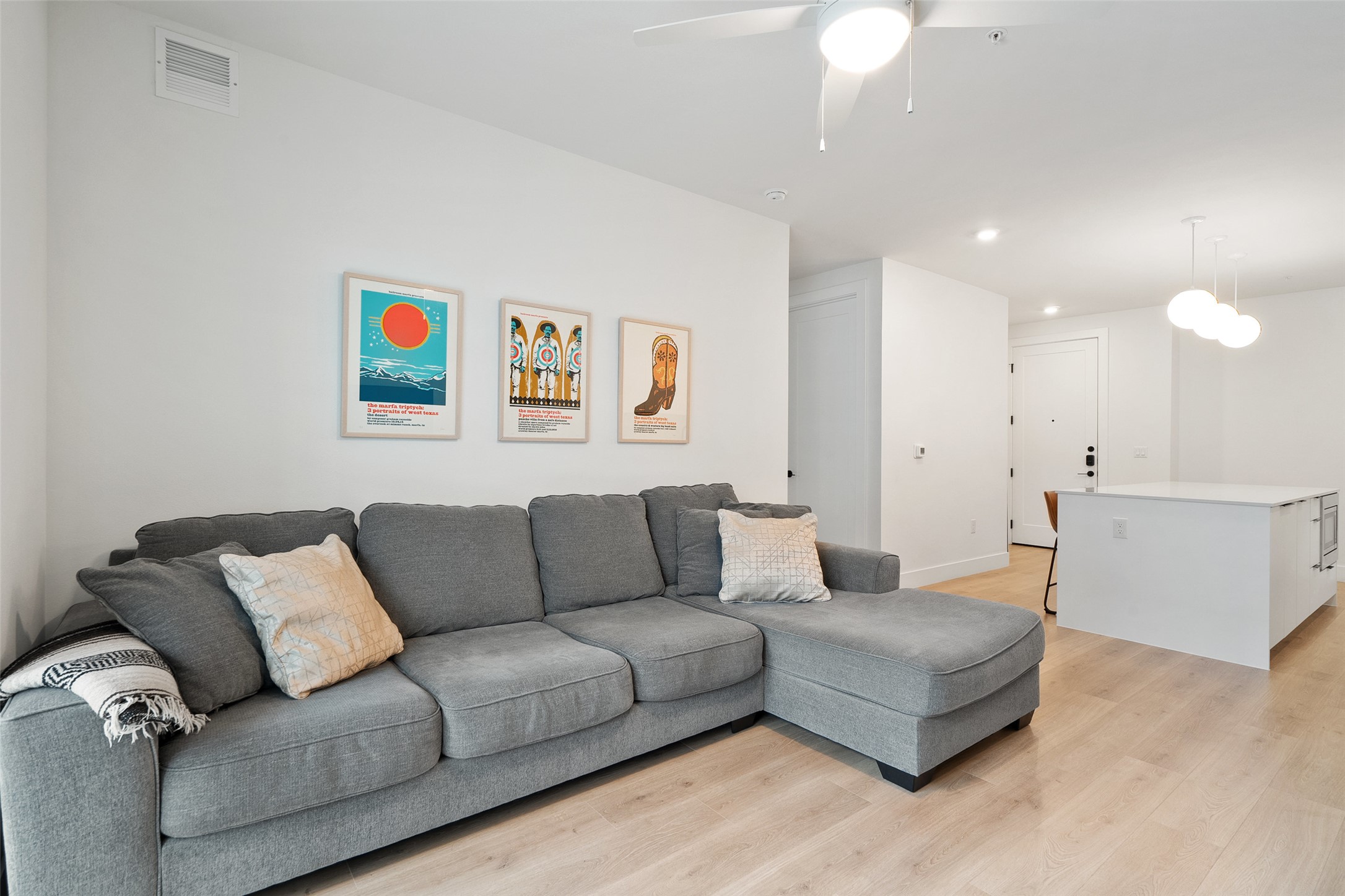 1701 Simond Avenue, Unit 305 Austin, TX 78723 - Photo 5 of 31 a living room with furniture and a couch