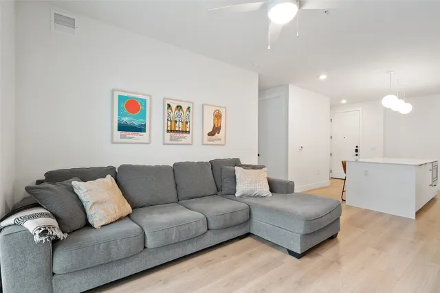 a living room with furniture and a couch