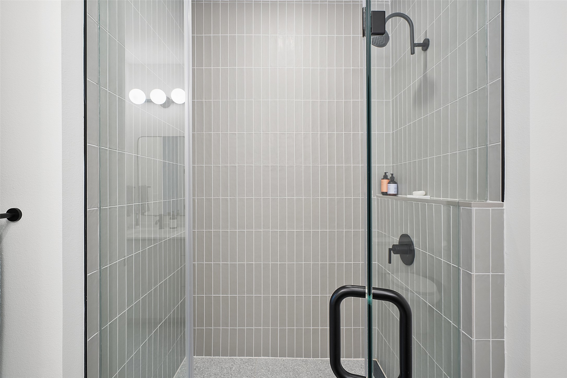 1701 Simond Avenue, Unit 305 Austin, TX 78723 - Photo 10 of 31 a bathroom with a shower