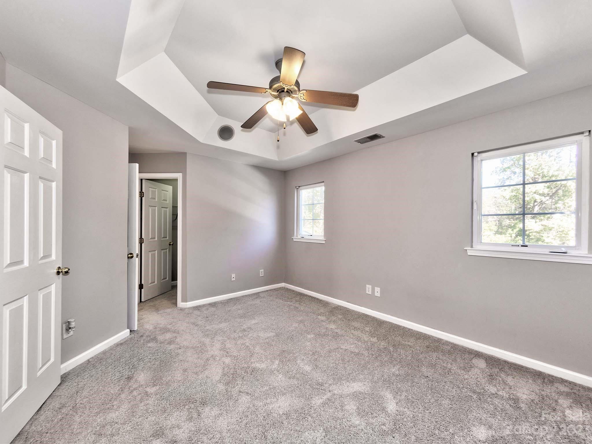 4849 Prosperity Ridge Road Charlotte, NC 28269 - Photo 23 of 40 wooden floor in an empty room with a window