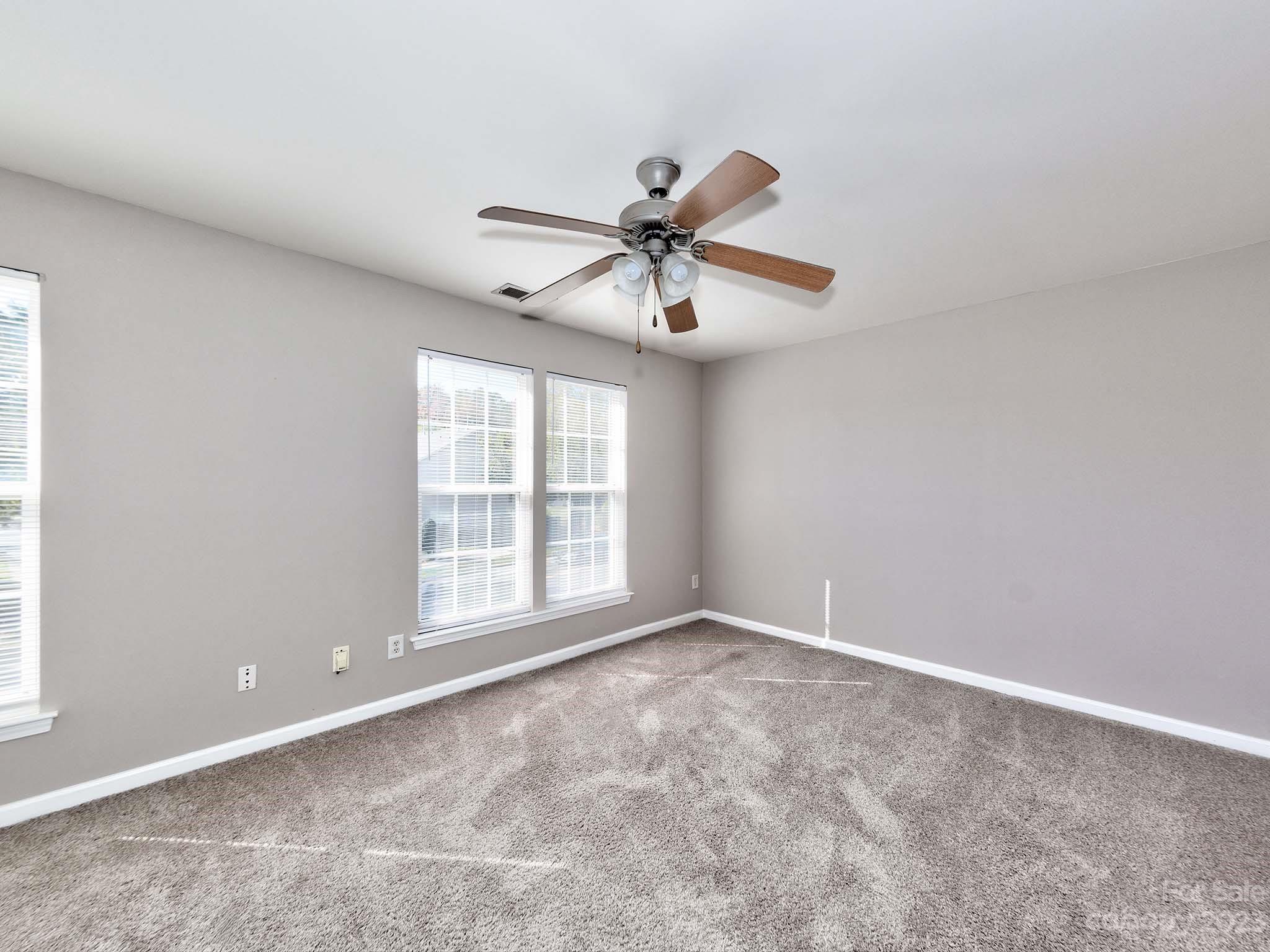 4849 Prosperity Ridge Road Charlotte, NC 28269 - Photo 25 of 40 a view of an empty room with a window