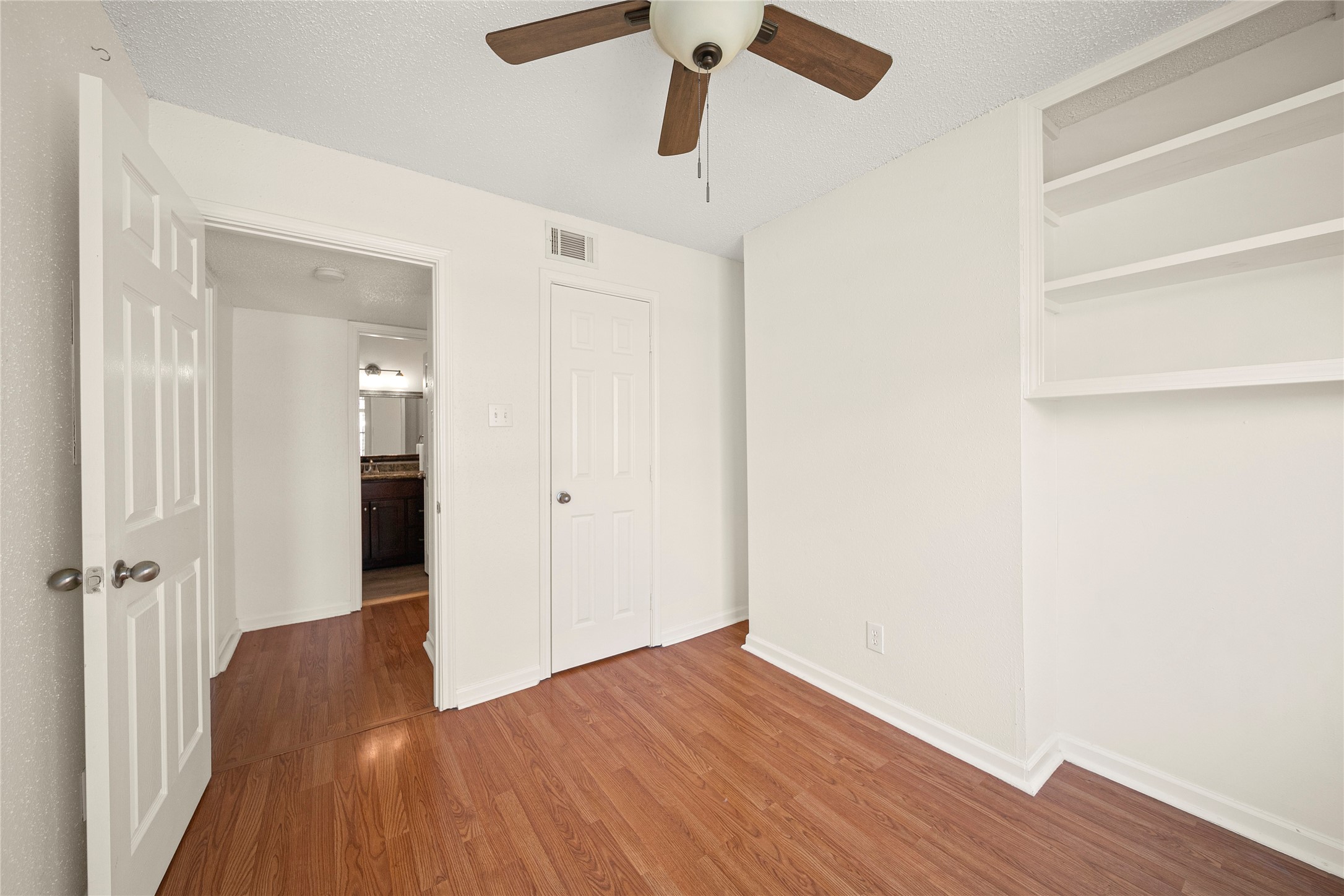 2750 Holly Hall Street, Unit 714 Houston, TX 77054 - Photo 15 of 18 wooden floor in an empty room