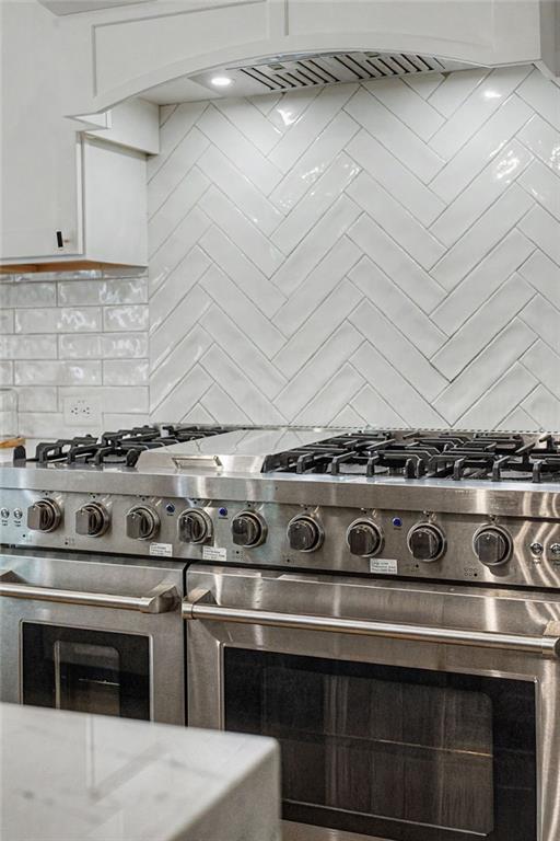 376 Hunnicut Road Southeast Mableton, GA 30126 - Photo 25 of 73 a stove top oven sitting inside of a kitchen