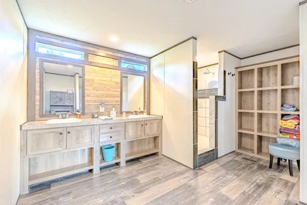 a view of cabinets and a window