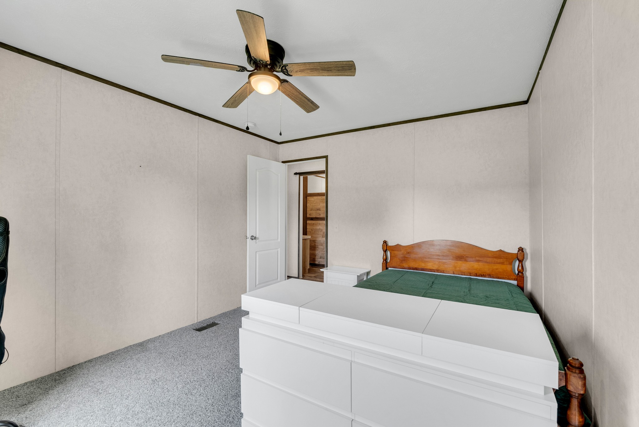 175 Lone Oak Drive Rickman, TN 38580 - Photo 18 of 37 a bedroom with a bed and a painting on the wall