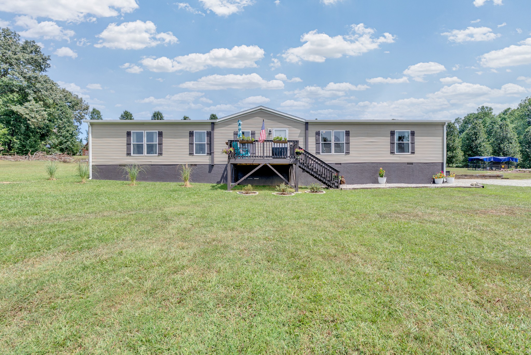 175 Lone Oak Drive Rickman, TN 38580 - Photo 2 of 37 a view of a house with a big yard and large trees