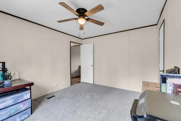 a view of workspace with hardwood floor