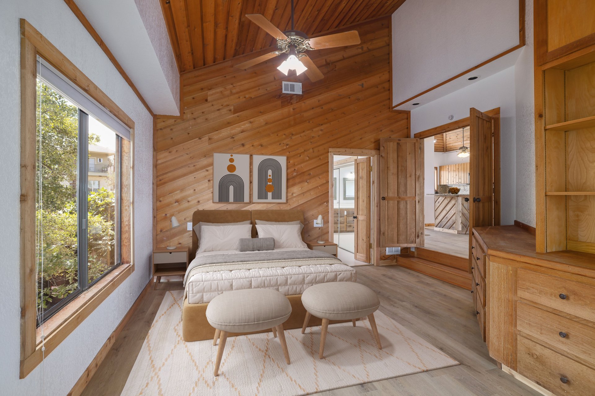 313 Kendall Road Spicewood, TX 78669 - Photo 11 of 34 Bedroom with wooden walls, light wood-style flooring, wooden ceiling, ceiling fan, and ensuite bathroom