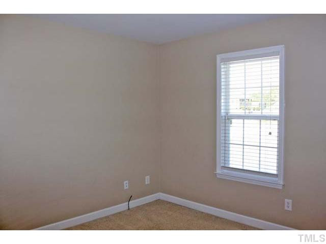 462 Axum Road Willow Spring, NC 27592 - Photo 11 of 18 The two secondary bedrooms are each a good size with plenty of closet space. Bedroom