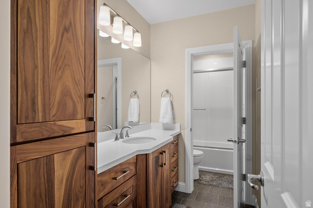 1456 Firelight Way Sandy, UT 84092 - Photo 13 of 22 Full bathroom featuring vanity and combined bath / shower with glass door
