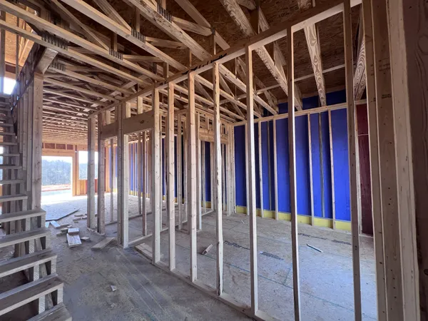 a view of a room with wooden walls