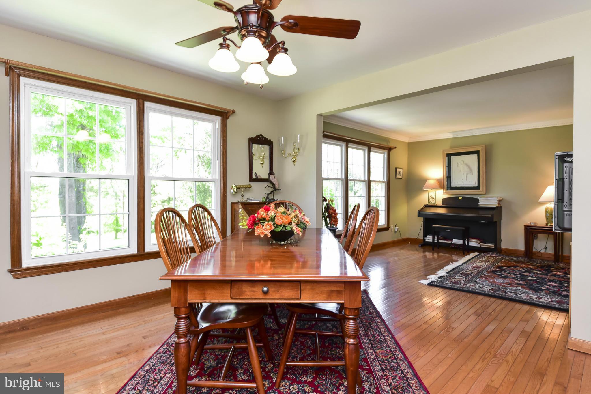 8033 Waterloo Farm Road Warrenton, VA 20186 - Photo 11 of 30 a living room with furniture and a wooden floor