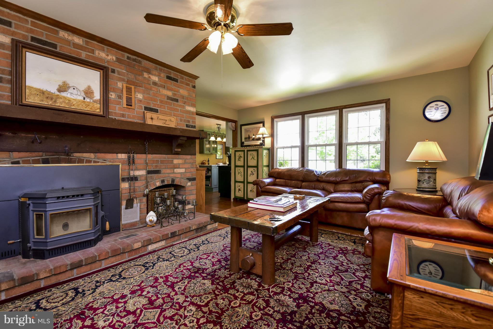 8033 Waterloo Farm Road Warrenton, VA 20186 - Photo 14 of 30 a living room with furniture fireplace and flat screen tv