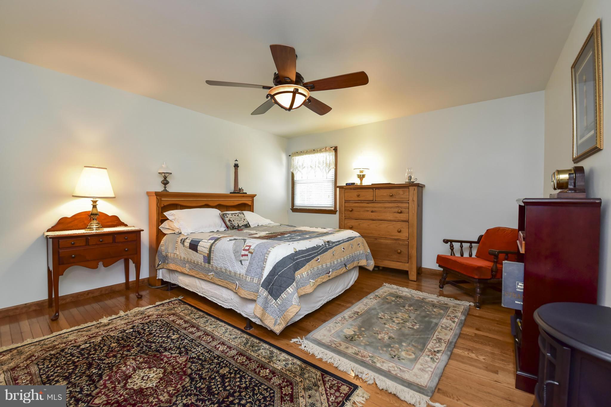 8033 Waterloo Farm Road Warrenton, VA 20186 - Photo 16 of 30 a bedroom with a bed and wooden floor