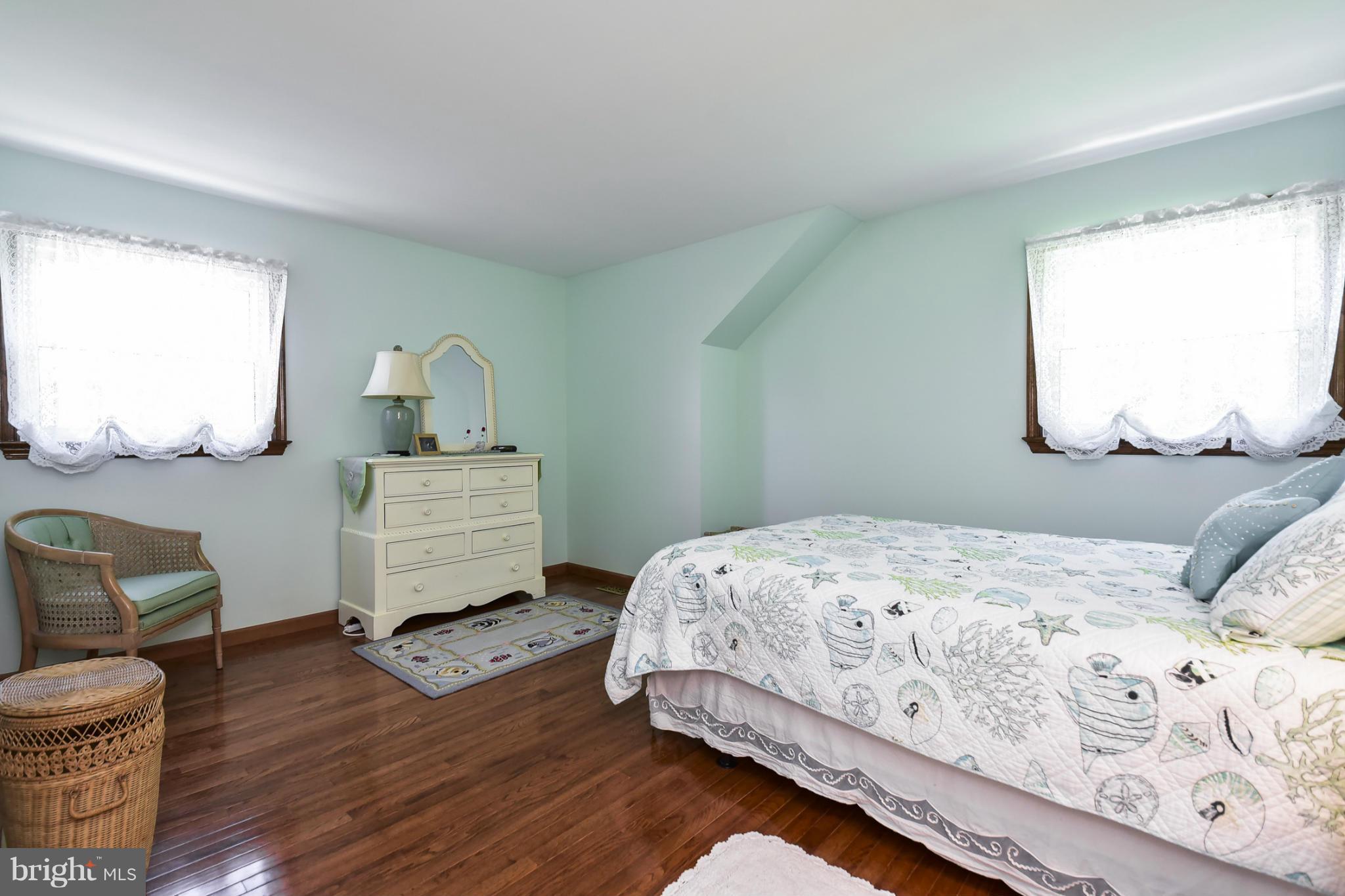8033 Waterloo Farm Road Warrenton, VA 20186 - Photo 20 of 30 a bedroom with a bed and wooden floor