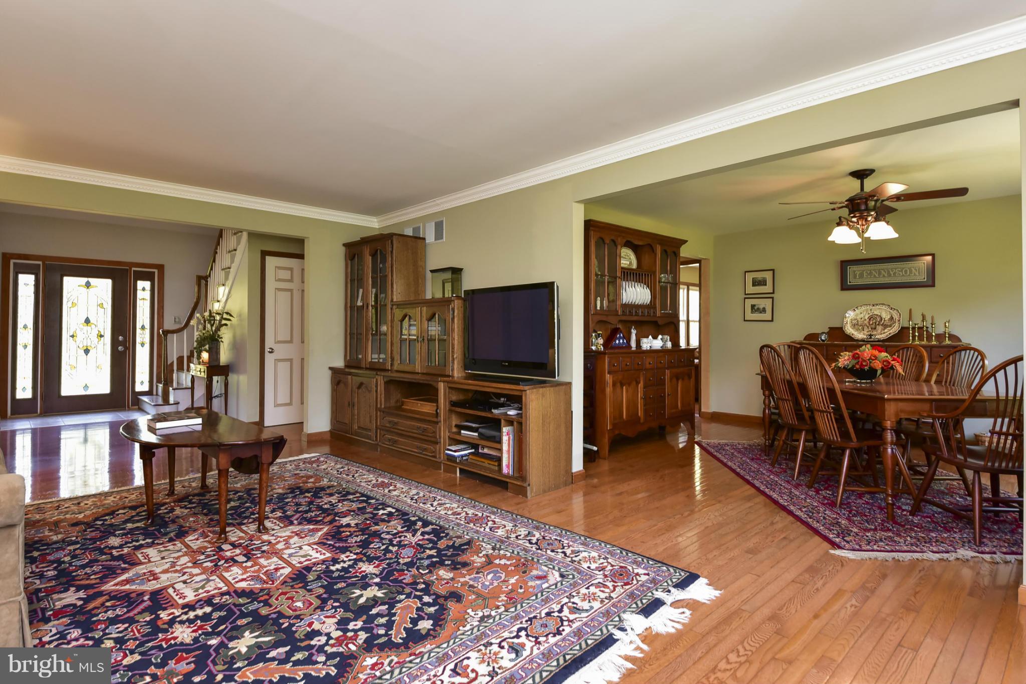 8033 Waterloo Farm Road Warrenton, VA 20186 - Photo 9 of 30 a living room with furniture and a flat screen tv
