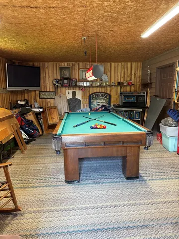 a room with lots of furniture and clutter