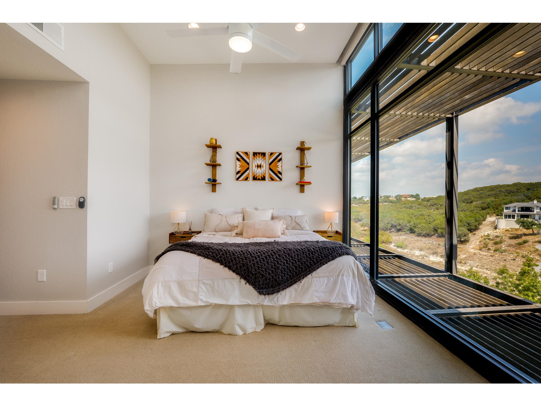 1101 Ivean Pearson Road, Unit A203 Lago Vista, TX 78645 - Photo 14 of 27 This spacious primary suite offers
an ensuite bath and a
HUGE walk-in closet.