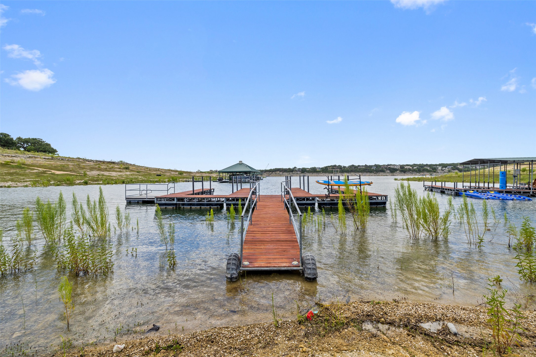 1101 Ivean Pearson Road, Unit A203 Lago Vista, TX 78645 - Photo 22 of 27 Boat docks, jet ski slips,
paddleboard storage and fishing
areas.
