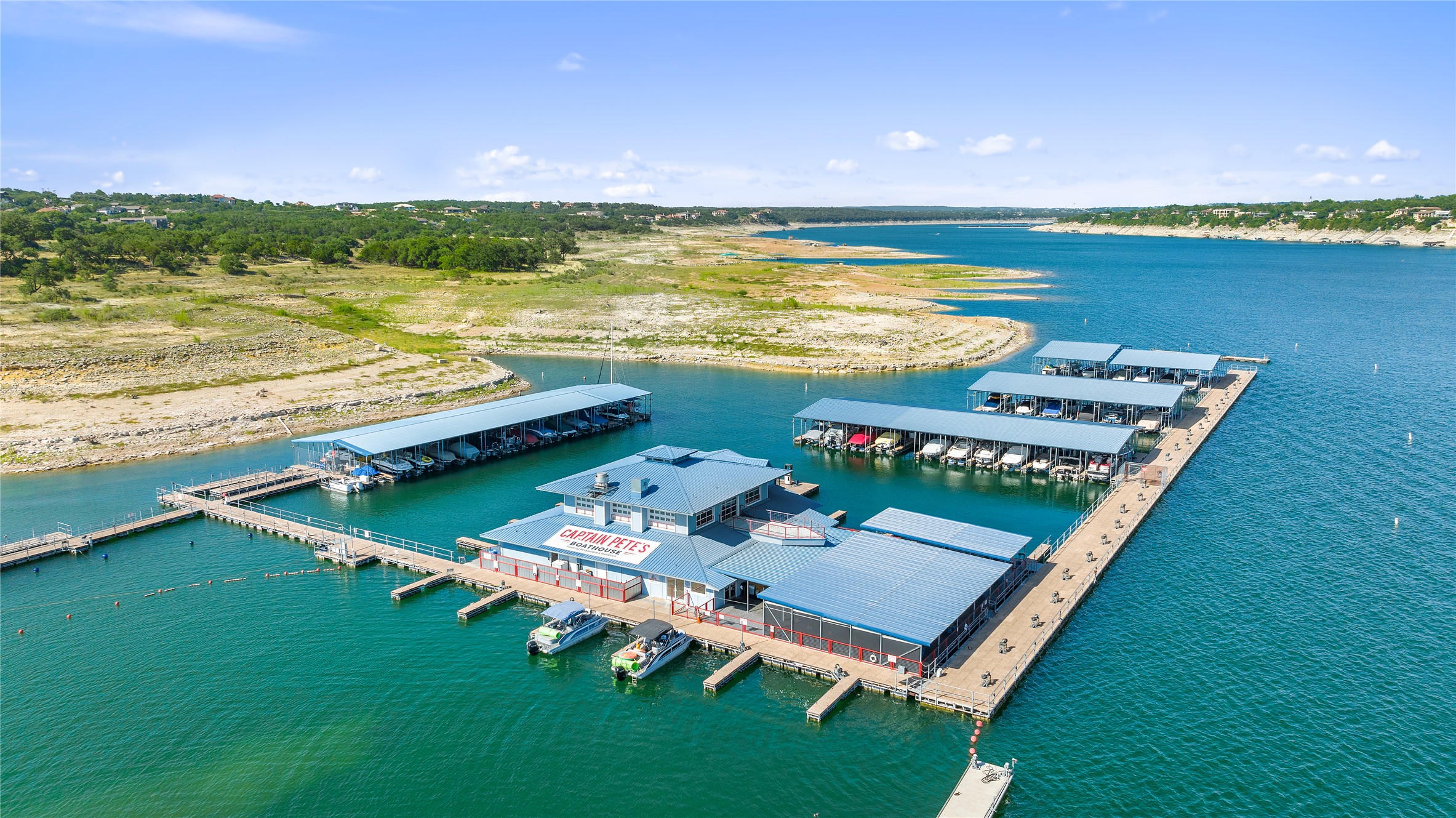 1101 Ivean Pearson Road, Unit A203 Lago Vista, TX 78645 - Photo 25 of 27 "Captain Pete’s Boathouse is the
premier floating restaurant and
bar on Lake Travis, located at
Point Venture right out on the
floating pier. By land or by lake
it’s like taking a vacation in your
own backyard!"