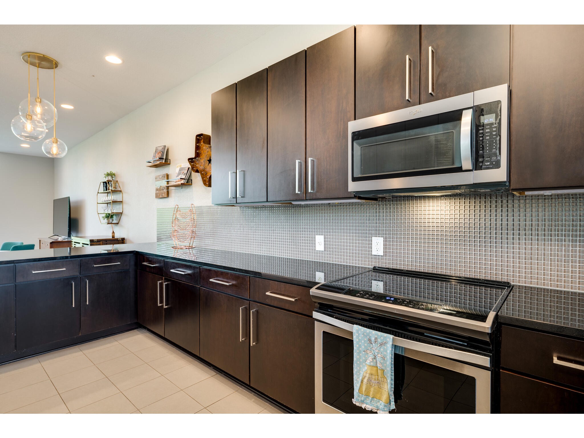 1101 Ivean Pearson Road, Unit A203 Lago Vista, TX 78645 - Photo 8 of 27 A breakfast bar provides
additional seating and is perfectly
located near the dining area.
