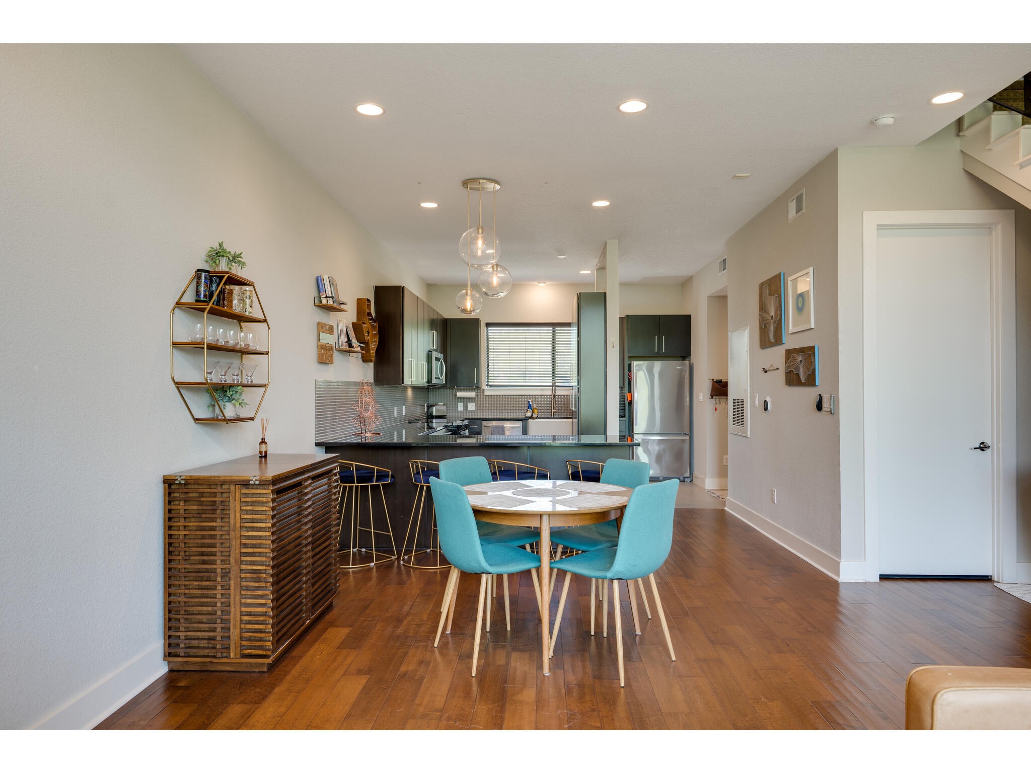 1101 Ivean Pearson Road, Unit A203 Lago Vista, TX 78645 - Photo 9 of 27 The dining area sits
between the kitchen and living
room.