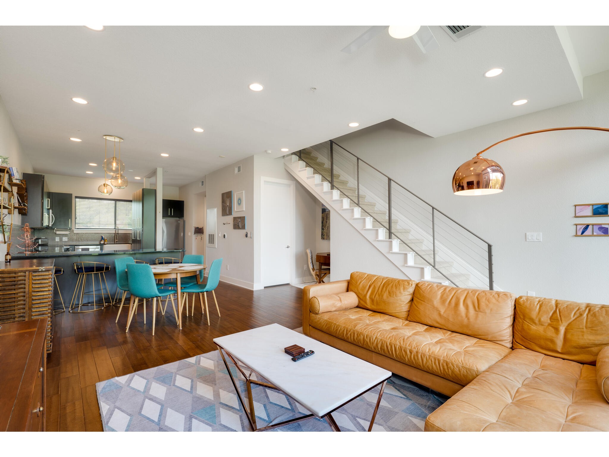 1101 Ivean Pearson Road, Unit A203 Lago Vista, TX 78645 - Photo 10 of 27 The main level features an open concept kitchen, dining, and
living room.