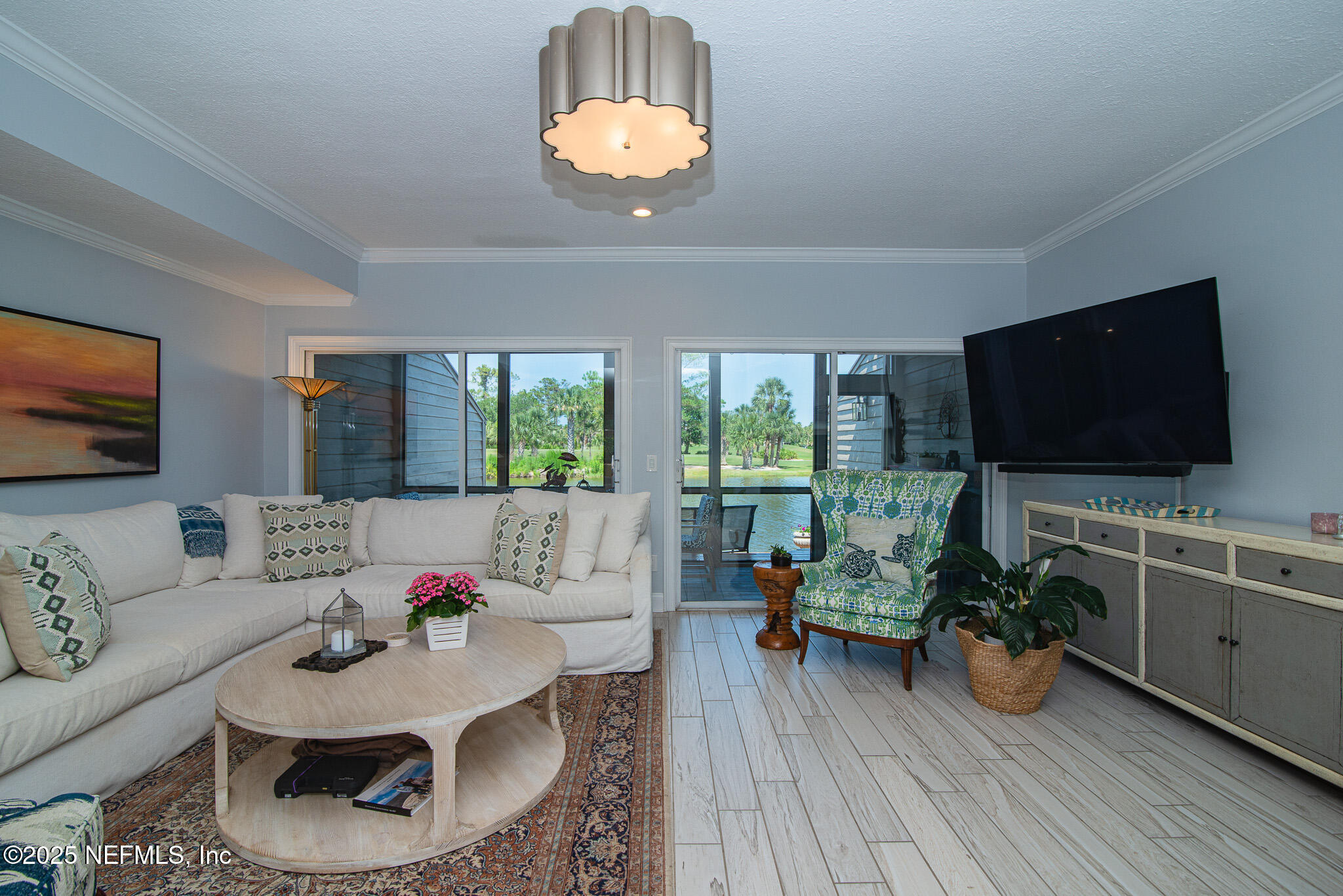 36 Fishermans Cove Road Ponte Vedra Beach, FL 32082 - Photo 16 of 51 a living room with furniture and a flat screen tv