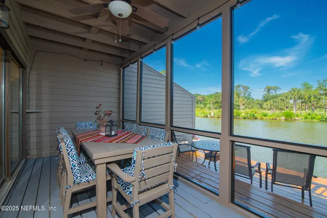 a spacious bathroom with a sink and a mirror