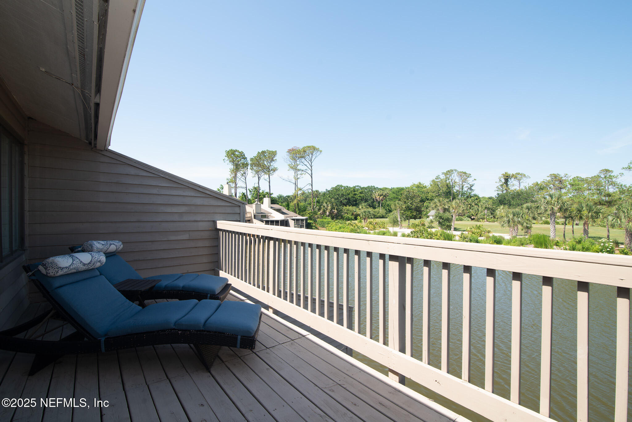 36 Fishermans Cove Road Ponte Vedra Beach, FL 32082 - Photo 28 of 51 a view of a roof deck with wooden floor and seating space