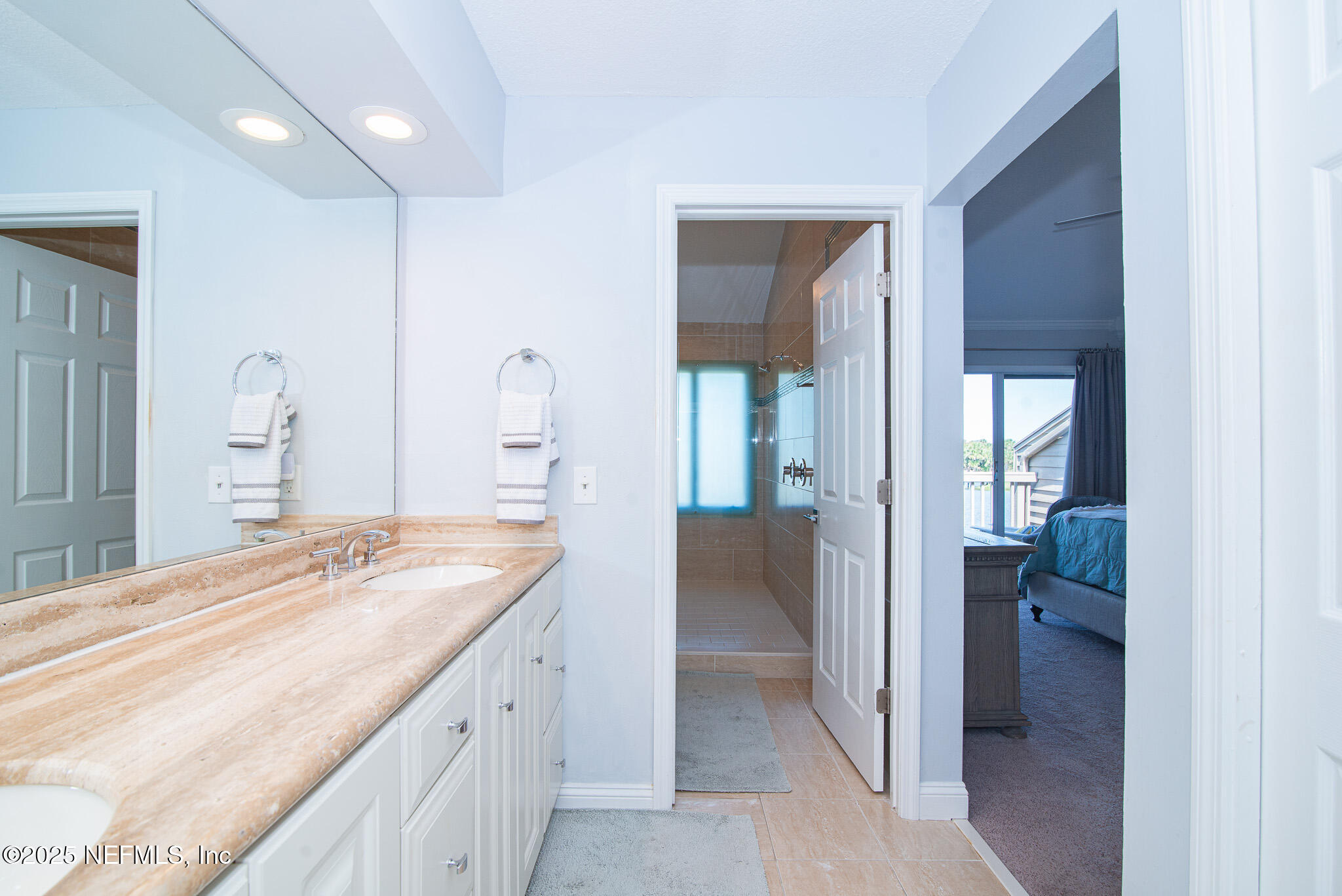 36 Fishermans Cove Road Ponte Vedra Beach, FL 32082 - Photo 30 of 51 a spacious bathroom with a granite countertop sink and a mirror