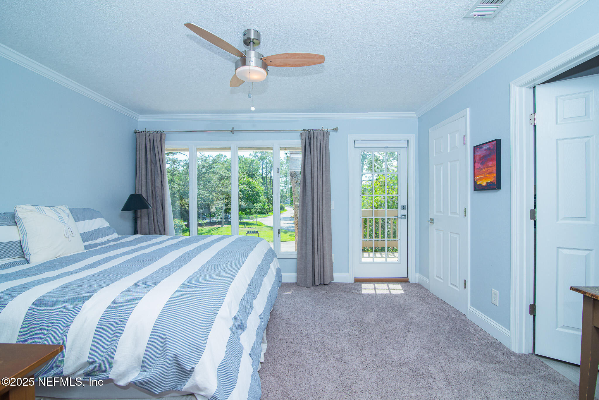 36 Fishermans Cove Road Ponte Vedra Beach, FL 32082 - Photo 34 of 51 a bed sitting in a bedroom next to a window
