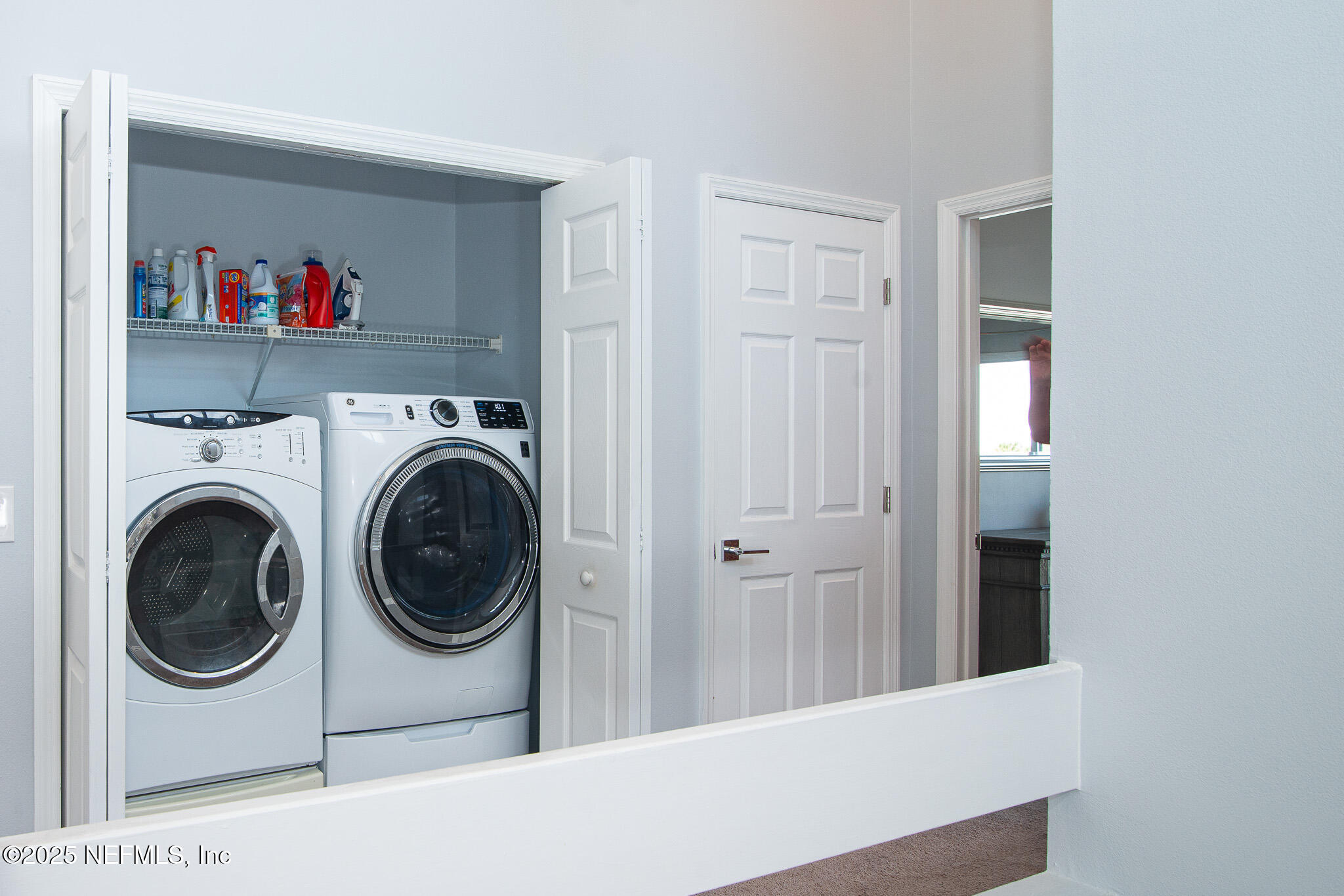 36 Fishermans Cove Road Ponte Vedra Beach, FL 32082 - Photo 38 of 51 a view of a hallway with washer and dryer
