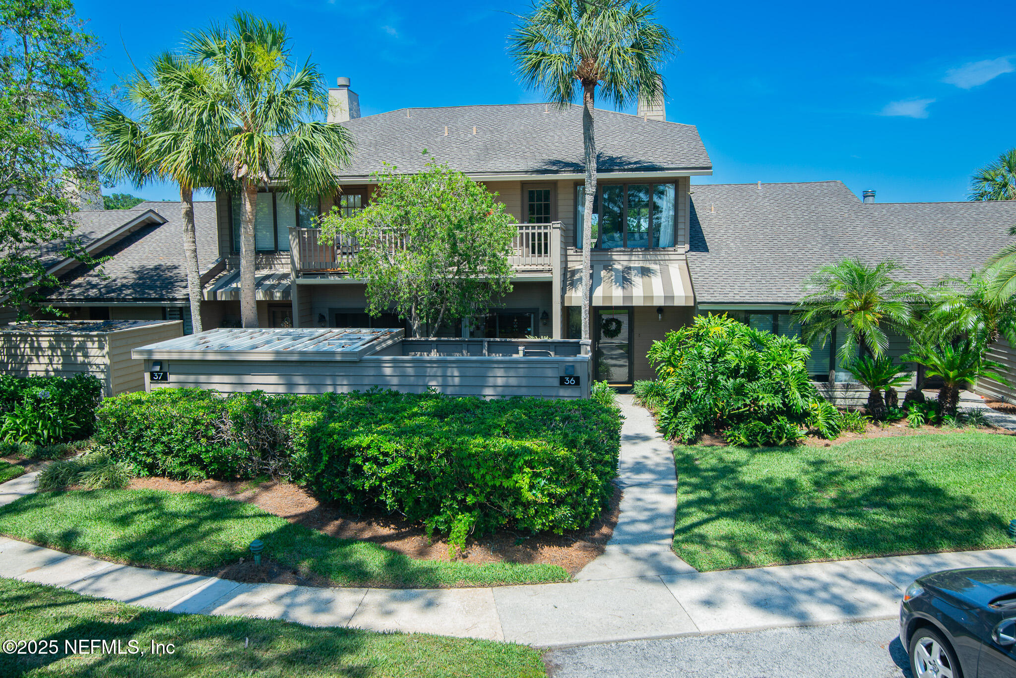 36 Fishermans Cove Road Ponte Vedra Beach, FL 32082 - Photo 6 of 51 front view of a house with a yard