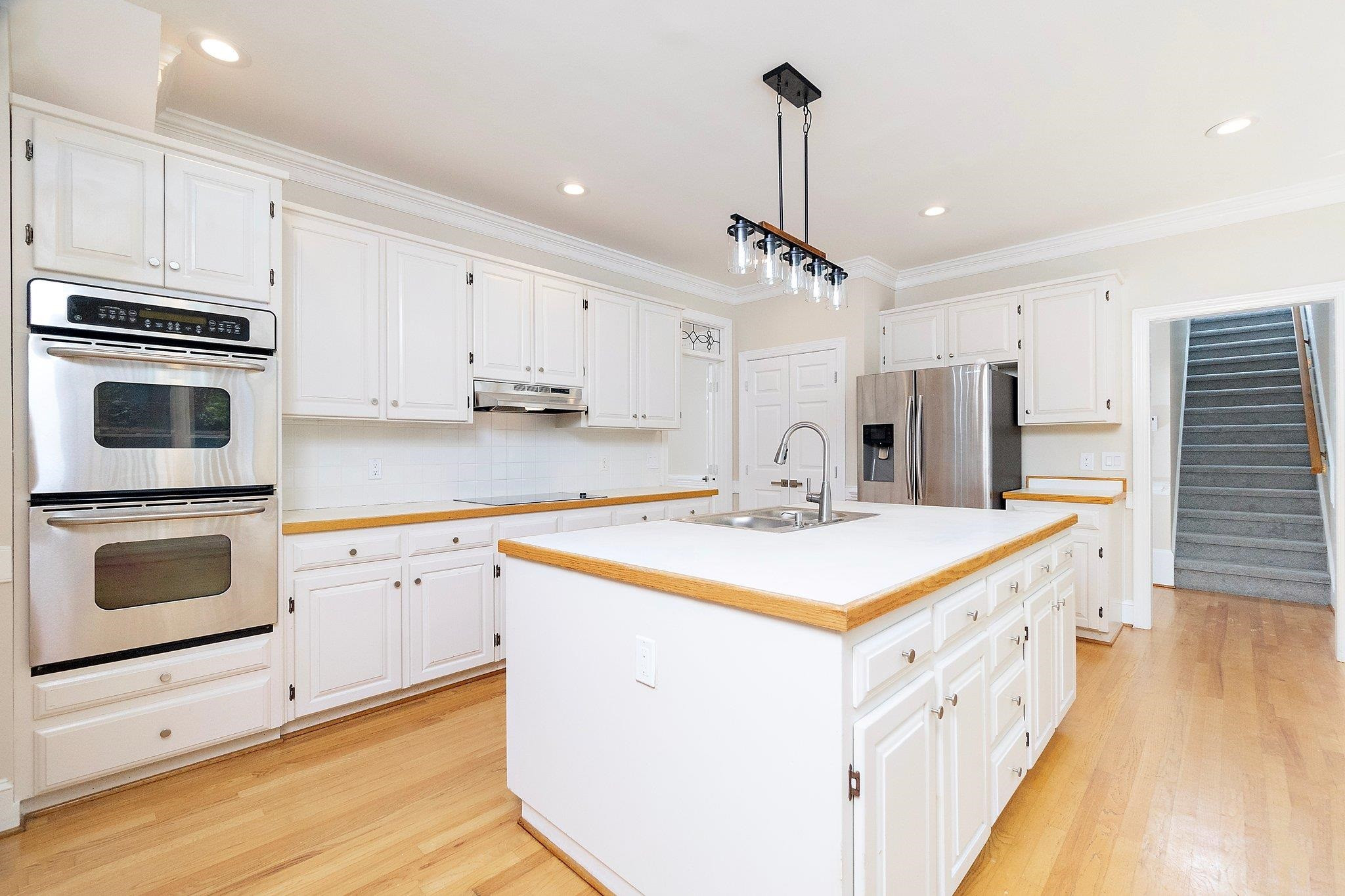 10108 Ethridge Court Raleigh, NC 27615 - Photo 10 of 51 Double Oven and Cooktop