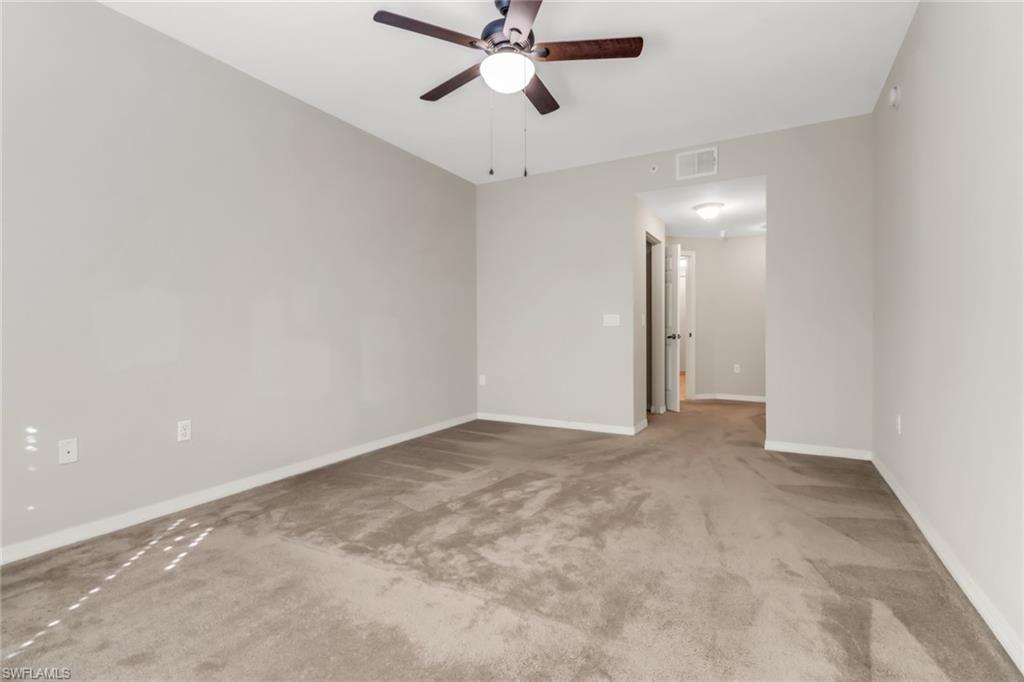 20160 Estero Gardens Circle, Unit 202 Estero, FL 33928 - Photo 15 of 44 a view of an empty room
