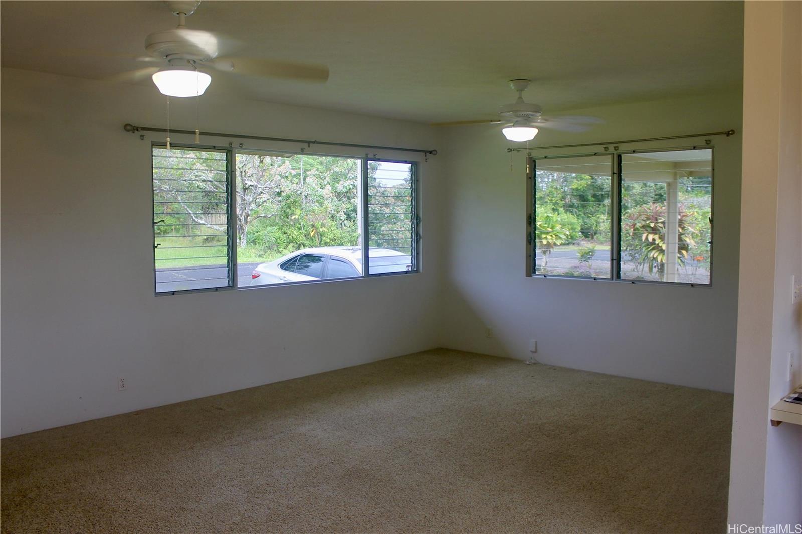 17-303 Pilikino Road Kurtistown, HI 96760 - Photo 16 of 19 a view of an empty room with a window