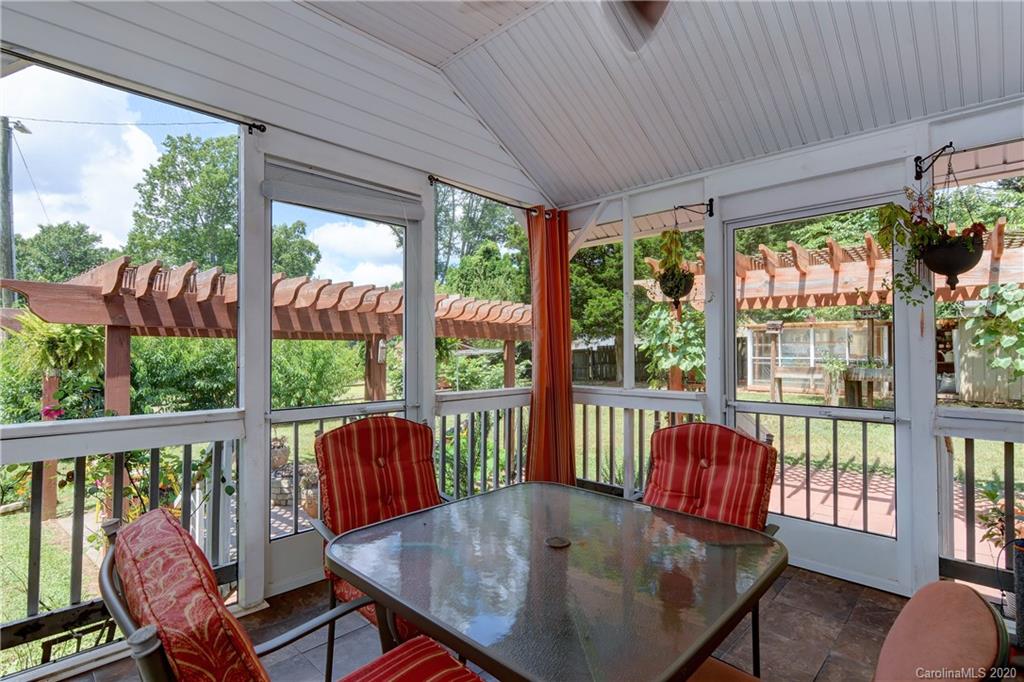 5700 Paw Creek Road Charlotte, NC 28214 - Photo 11 of 19 a view of a dining room with furniture window and outside view