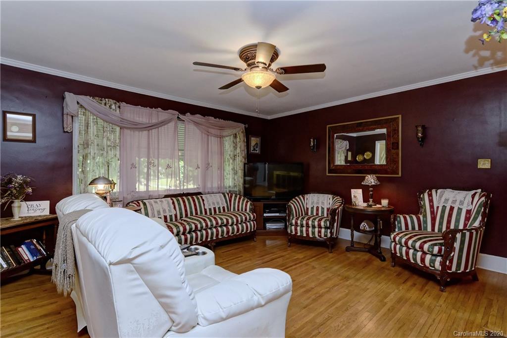 5700 Paw Creek Road Charlotte, NC 28214 - Photo 3 of 19 a bedroom with furniture and a window